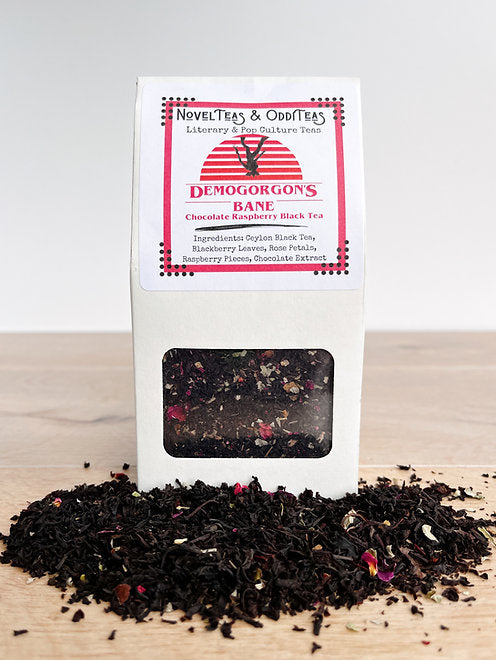 Demogorgons Bane package surrounded by loose tea leaves