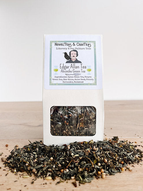 Edgar Allan Tea package surrounded by loose tea leaves