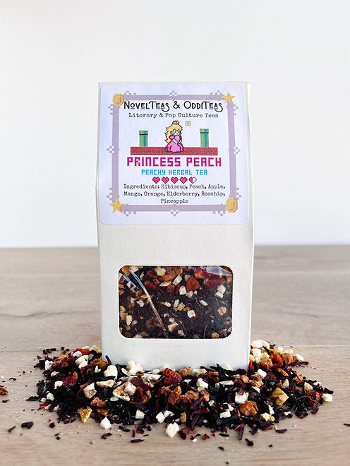 Princess Peach tea blend package surrounded by loose tea leaves