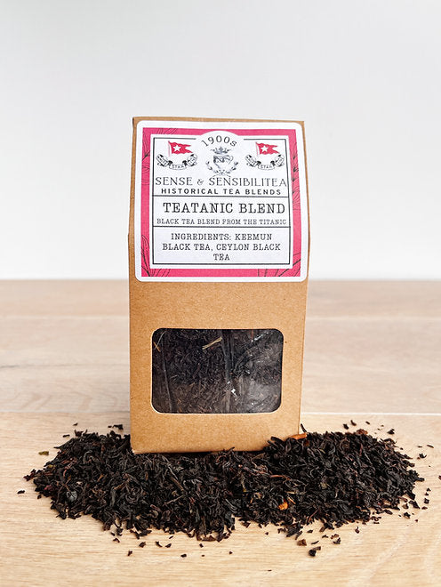 TeaTanic tea blend package surrounded by loose tea leaves