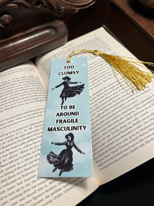 Too clumsy to be around fragile masculinity bookmark with two women appearing like they are dancing on it